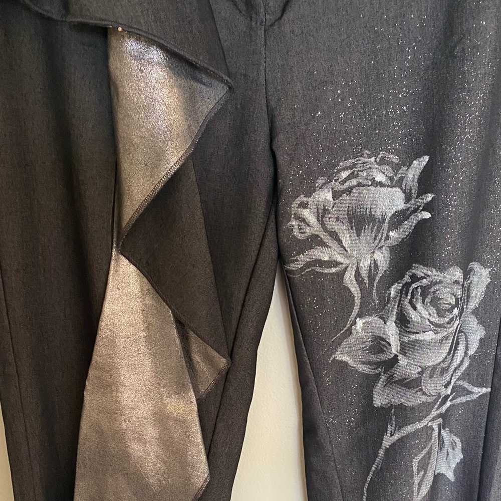 Save the Queen pants with unique detail  size S. Like new condition